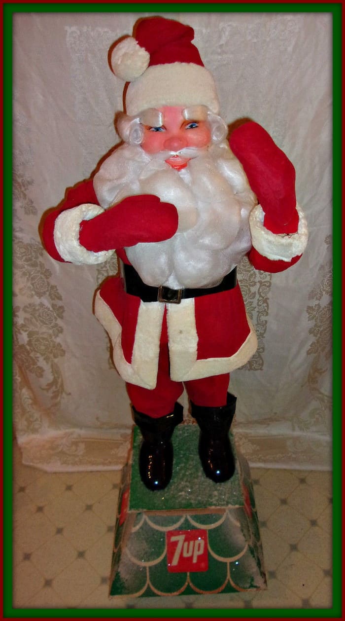 This is a nice vintage advertisement Santa and he is 51 inches tall including the stand ... and the stand is 16 inches square.