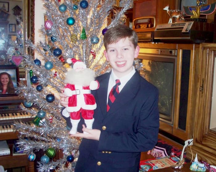 The smaller 15 inch Santa dressed in red satin with white go-go boots and a white belt is today one of the most widely listed Santa for sale on eBay. These were the first Santa's made for the general public to buy for their home displays made by Gale