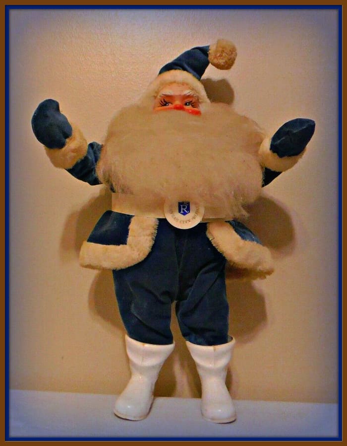 This is a wonderful 14 inch Royals Santa Claus, he was made by Harold Gale for the Kaufman Foundation Dinner after the Royals won the world series in 1980. This Santa is in a velvet Suit that is royal blue, & he has a nice KC Royal emblem on his belt