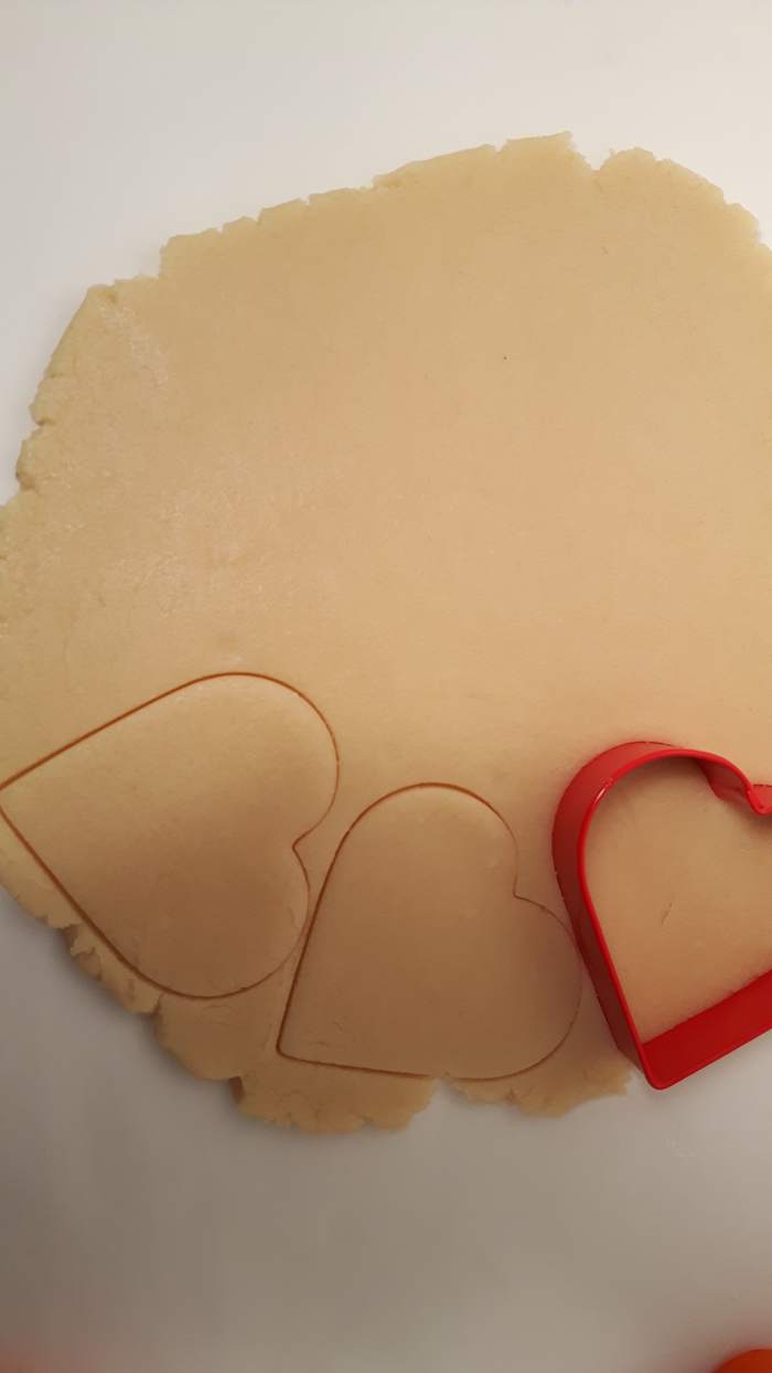 Fit the cutters on the dough like a jigsaw puzzle. Fit the cuts as close together as you can without overlapping until you can't fit any more in.