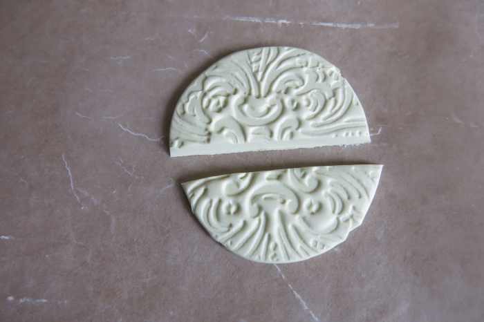 Stamping your clay to make a design for your bird's wings