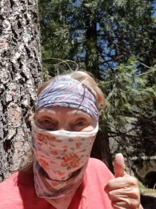 Rock painting provides a peaceful outlet. The author gives a "thumbs up" during the Covid-19 crisis as she uses this time to discover creativity.