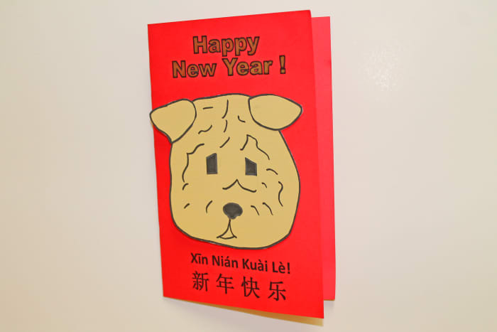 Sample Shar-Pei Card. The template for the card background is available above this post and the pattern for the dog's face is available below.