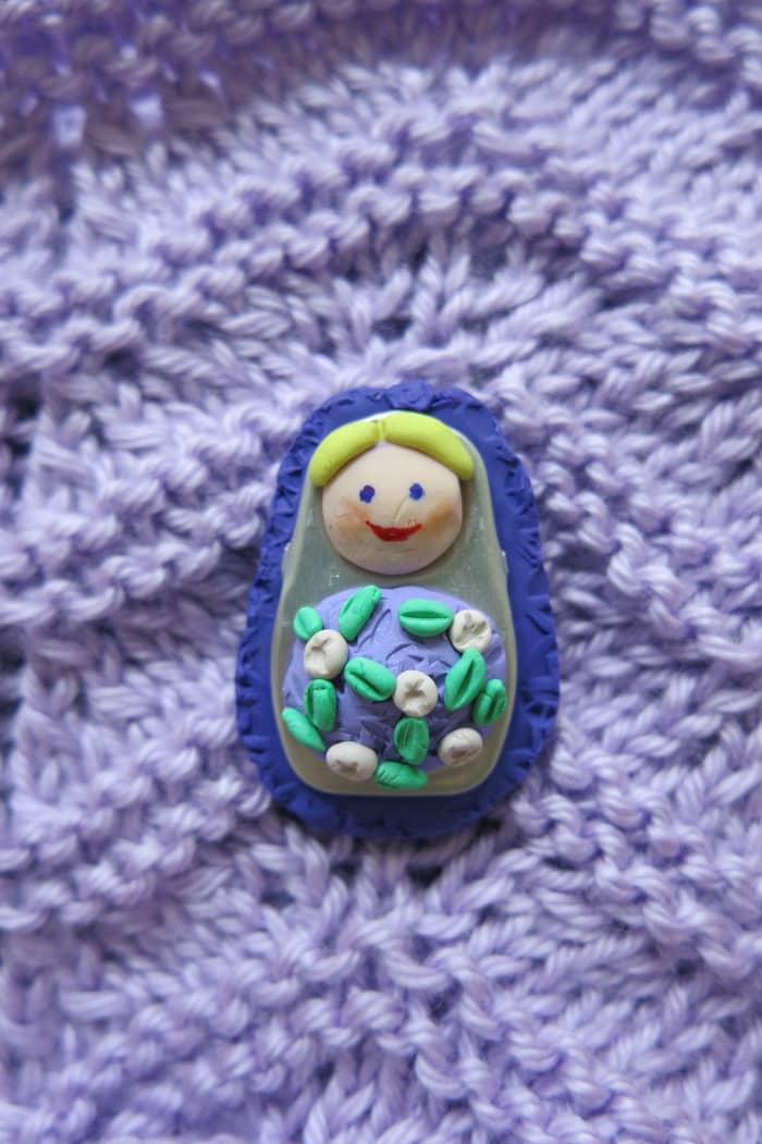 Your Matryoshka-style polymer clay dolls can also be used to create a beautiful pin or brooch.