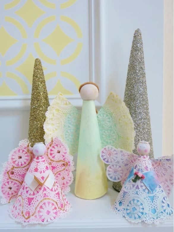 These colorful angels are made from a simple paper plate, a lace doily, and some basic art supplies.
