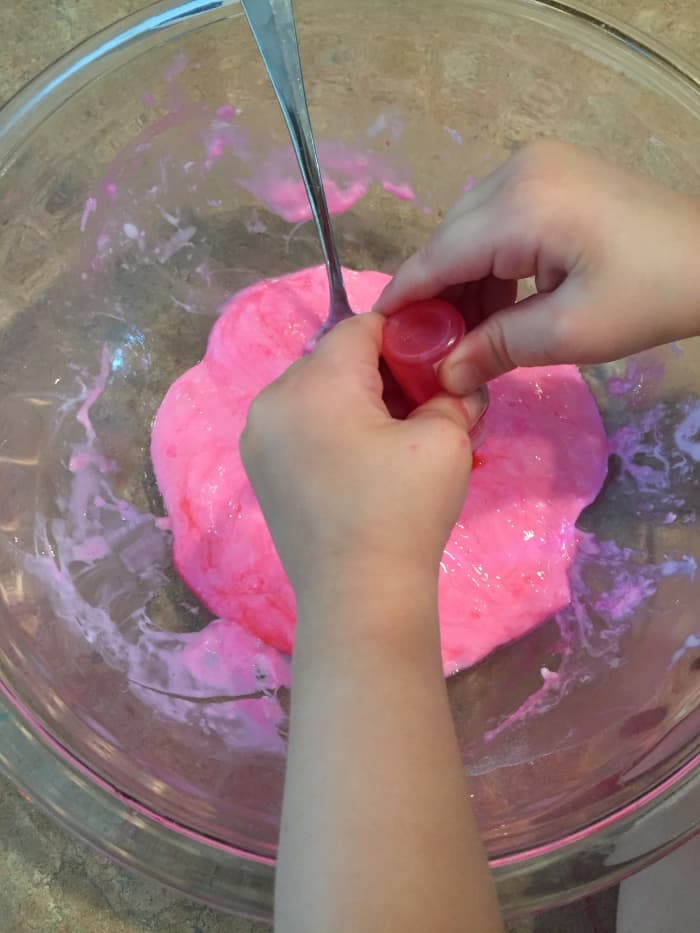 Once all of your ingredients are mixed, add optional food coloring, essential oil, or other cool mix-ins like glitter!