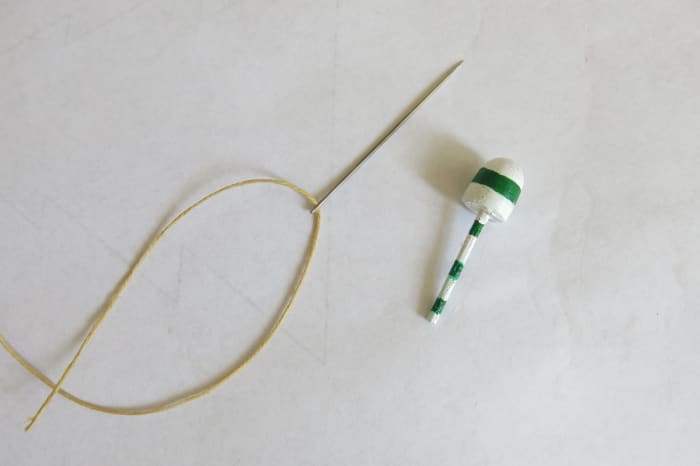 To add rope, use an embroidery needle with a sharp point and an eye large enough to accept your thread.