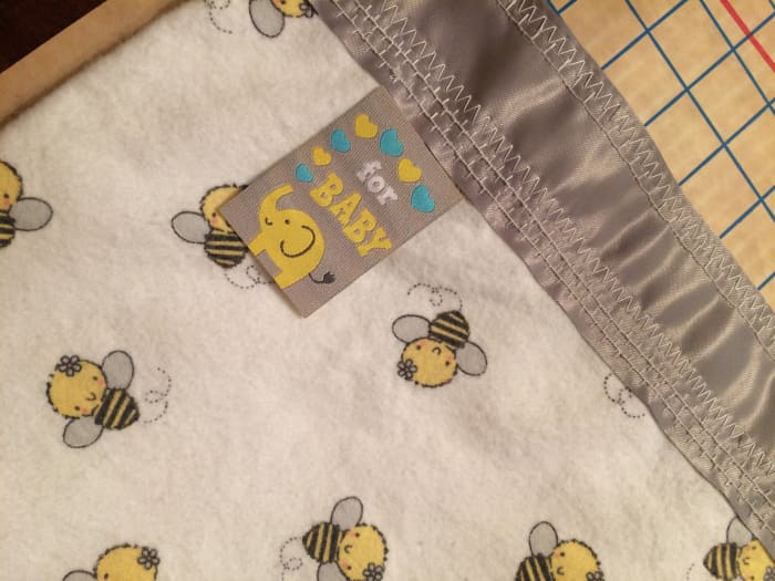 Notice that I used several rows of stitches for this blanket to add some personality to the blanket binding.
