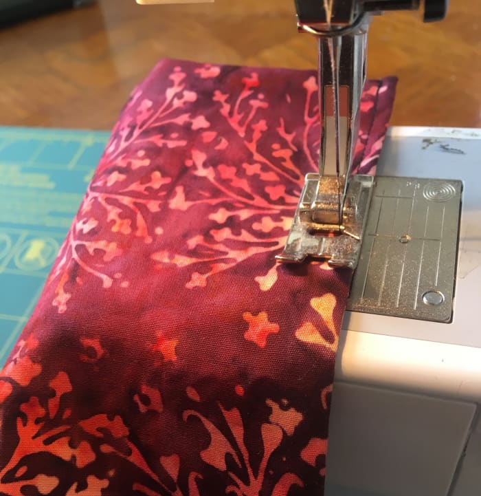 On my sewing machine I can move my needle over to get a smaller seam; on some machines you simply have to move the fabric.