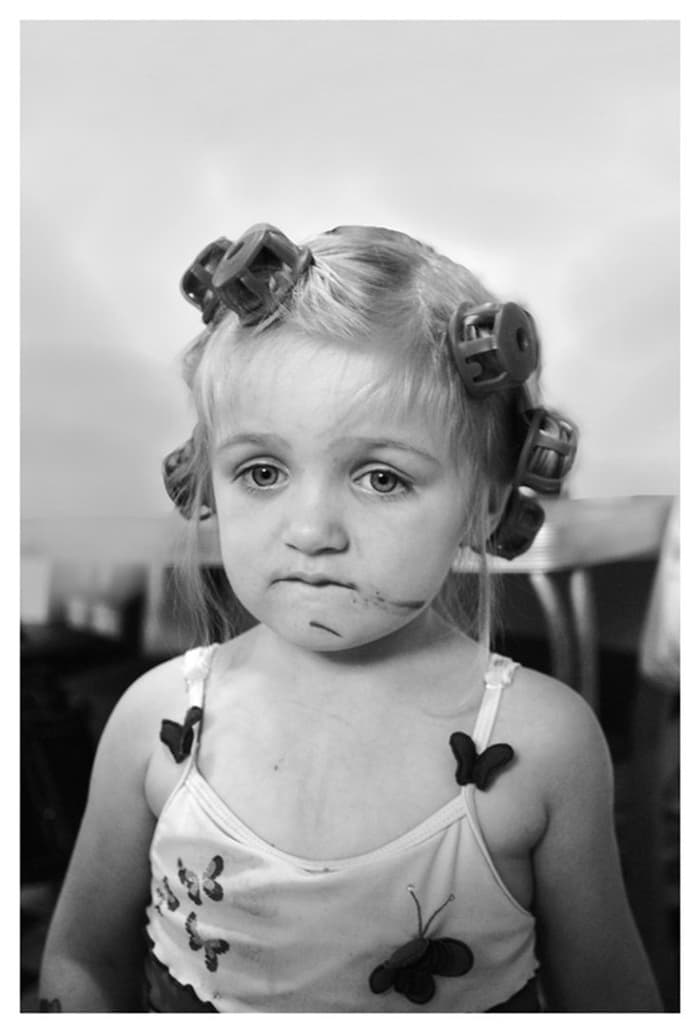 "Tired." Anyone who has kids has seen this look. After a day of baking cookies, playing, painting and drawing, swimming, biking and a makeover, my niece was ready for nap time.