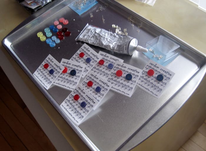 I have dedicated trays for planning button stud earrings and button magnets.