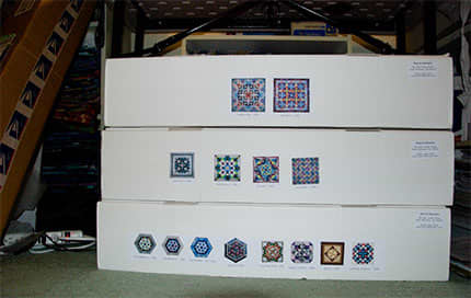 Consider boxes or other larger containers for storing sizable items, such as quilts. Make sure that they are cushioned appropriately.