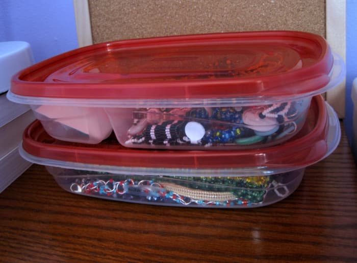 I keep two containers by my light box: one for pieces I need to photograph and one for new pieces I recently photographed but haven't sorted or tagged yet.