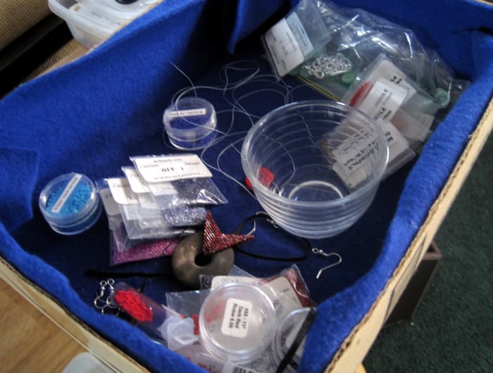 I use this lined box for storing large quantities of beads for in progress pieces or for organizing bead lay outs for future pieces.