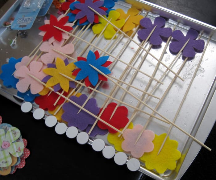 I like to use cheap cookie sheets for drying all sorts of different small craft projects.
