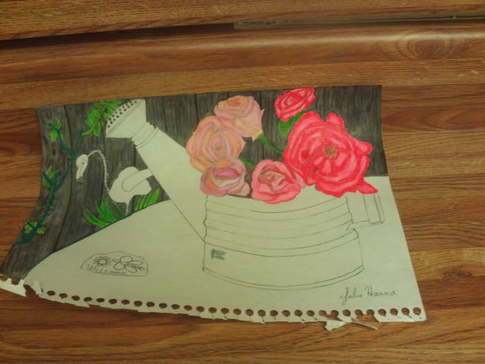 Here I have finished coloring in the fence for the drawing. It is looking pretty darn realistic.