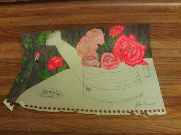 Here I am beginning to color in the whimsical flamingo decoration in the background.