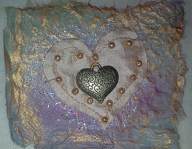 The tiniest scraps of silk can be made into an embellishment for a handmade card or wall decoration.