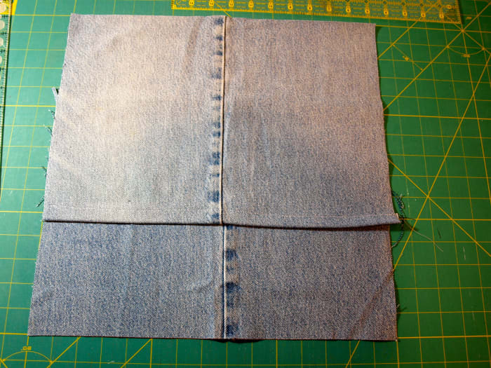 This is what the back of the pillow cover will look like. Pin on the left and right sides where the fabric overlaps.