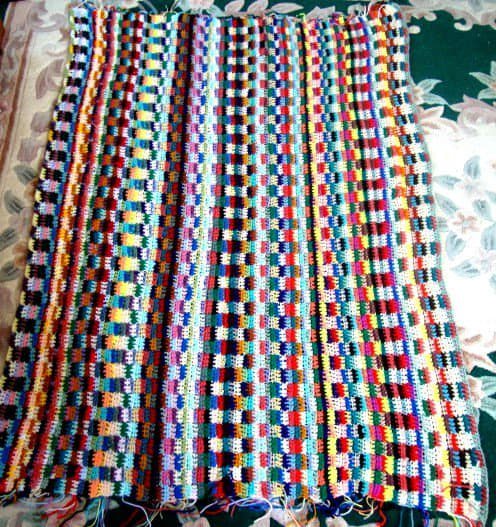 With a scrapghan, you can choose how big or small you want to make it, since this is done without an actual pattern.
