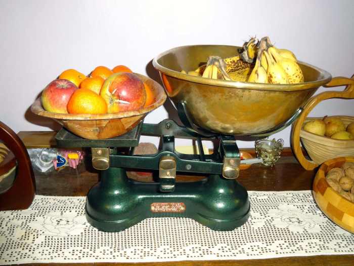 Renovated scales in pride of place on the sideboard as a novelty fruit bowl.