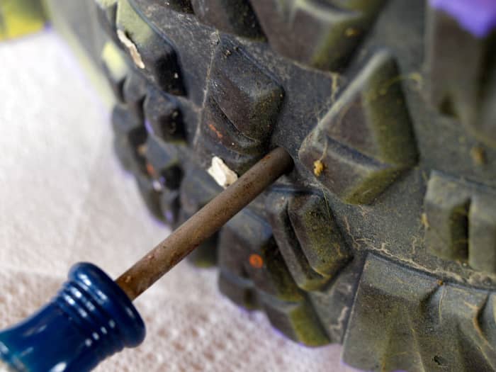 Don't forget to poke holes in the bottom of your boot flower planter for water drainage.