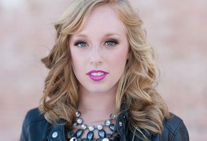 See how sharp her eyes are? I choose my focal point right between her eyes. This was with my Sigma 85mm