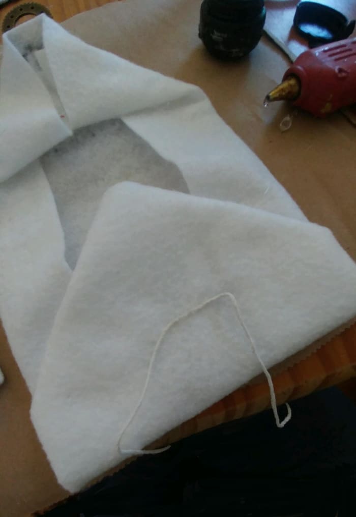 Glue a string on envelope to tie closed.