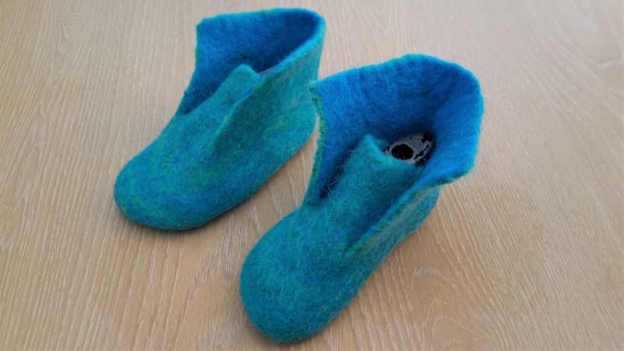 Slipper tongue, still requires more soap and water to seal cut edges and shrink neatly against the shoe lasts.