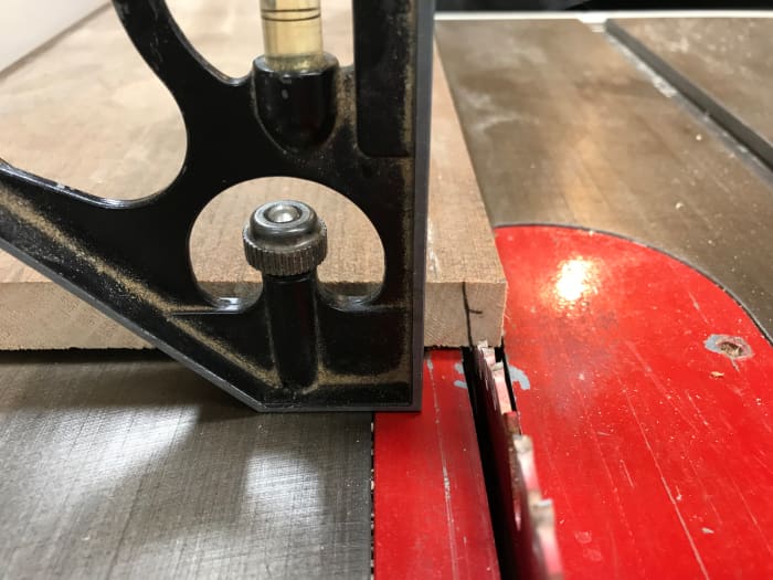 Bevel the back to match the slope of the sides. The table saw blade is tilted to approximately 6 degrees.