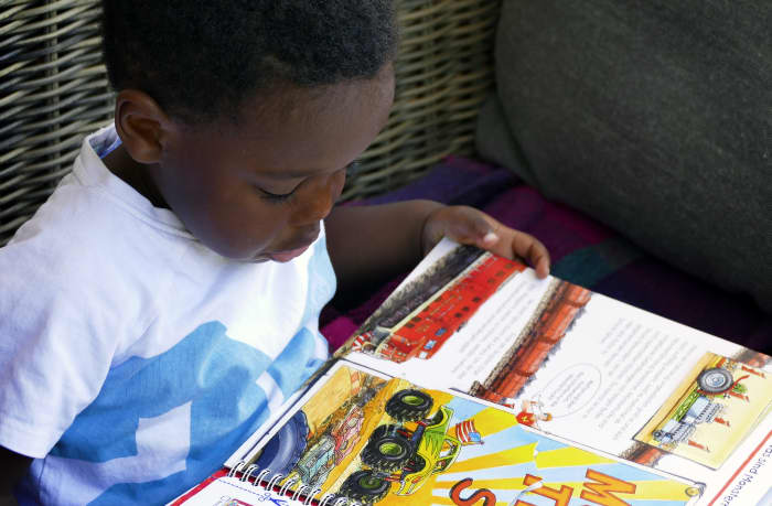 Young children sometimes need a quiet spot to calm down. Provide a space with a blanket to sit on with a few toys, or a colorful picture book to read.
