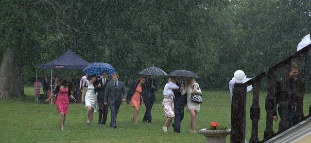Even if your ceremony is going to be open-air, it's important to have a tent to provide shade from the sun and protection from rain.