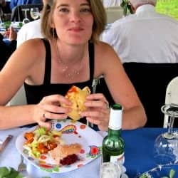 I love cooking on a budget, and a wedding is a great opportunity to save on catering—and show off your culinary skills. The food I'm enjoying in this photo is homemade!