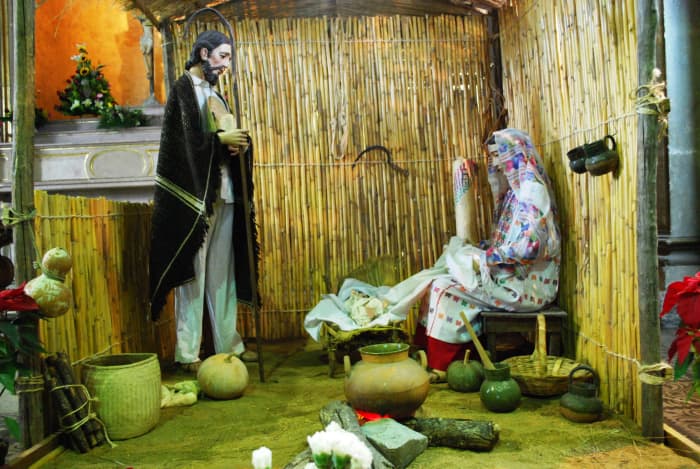 Part of a nativity scene from the Church of the Company of Jesus in the city of Oaxaca. Joseph and Mary are dressed in Oaxacan costume.