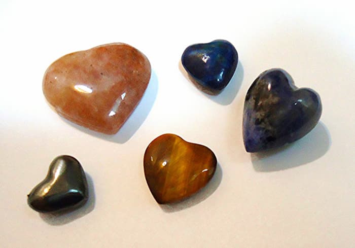 Rose quartz (upper left) is said to be "a happy and loving stone," enhancing all types of love and reducing stress.