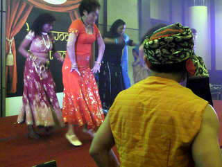 Photo 7: Bollywood Dance performance by one of the team competing for the Bollywood Dance competition