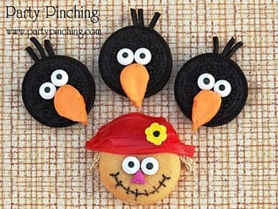 You can decorate Oreo cookies in so many evocative ways. Here, they're turned into a flock of crows bothering a scarecrow.