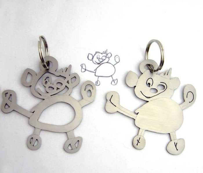 Moms can turn their little ones' doodles into keepsake key rings using polymer clay. What a clever DIY gift for Father’s Day.