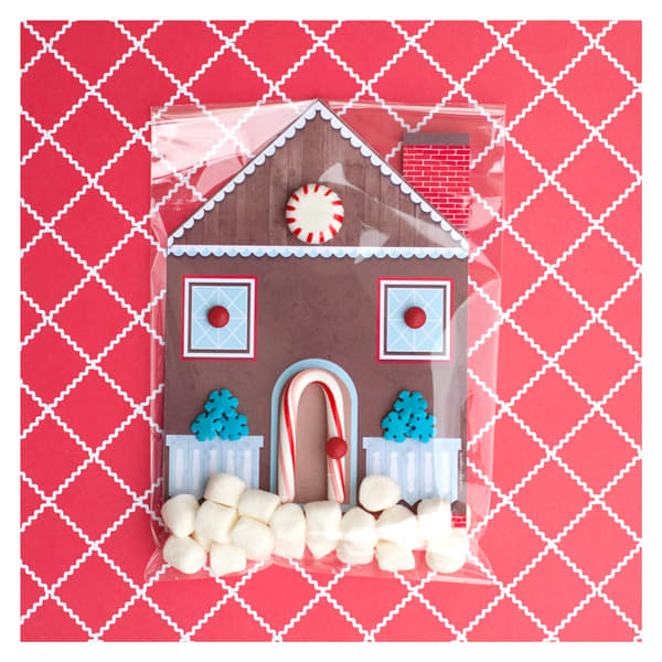 Feel like creating something really cool this Christmas? Try this printable gingerbread house card, decorated with real candy.
