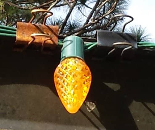You can use one or two clips, depending on how you are positioning the light. You can use the clips for several years. If one gets rusty, just replace it when you are putting up the lights.