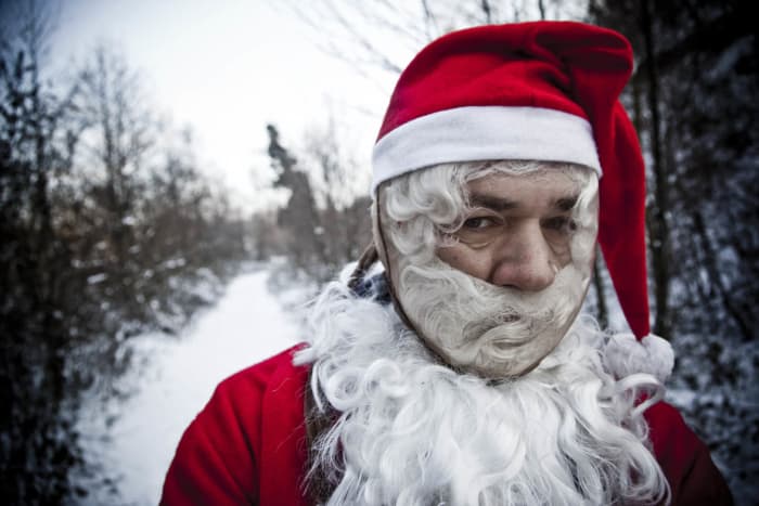 Is this Santa mad because he's been denied entry? Did he get stuck in a chimney? What's his problem?