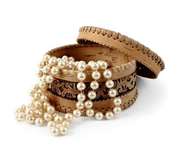 A string of faux pearls are lovely for a nice evening out, and you don't have to worry too much if they get lost or stolen on your trip.