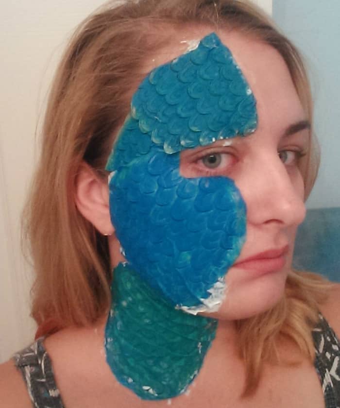 As you can see it looks pretty dumb when you first adhere the scales. don't be deterred - some makeup magic will help hide the individual pieces. Don't be afraid to cut your prosthetics to fit.