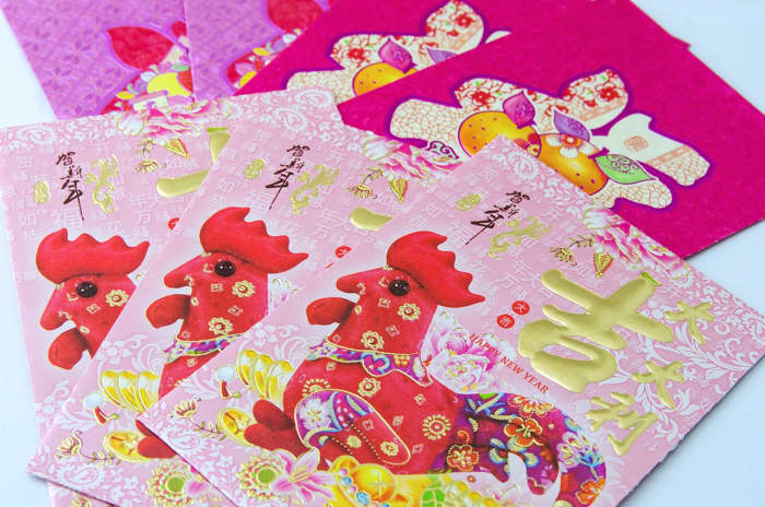 Singaporean Chinese children love the lunar spring festival for they receive hong bao, or red packets. Traditionally, these are red envelopes containing money. Nowadays, hong bao come in all shades of vibrant colors too.
