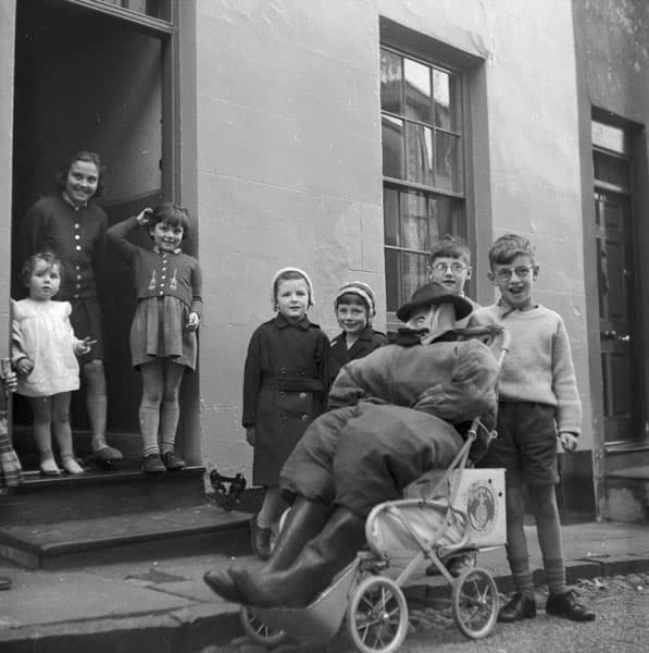 Making an effigy of Guy Fawkes and begging for money to buy fireworks was once common practice amongst working g class children. 1960 in Wales. Children with an effigy of Guy Fawkes.