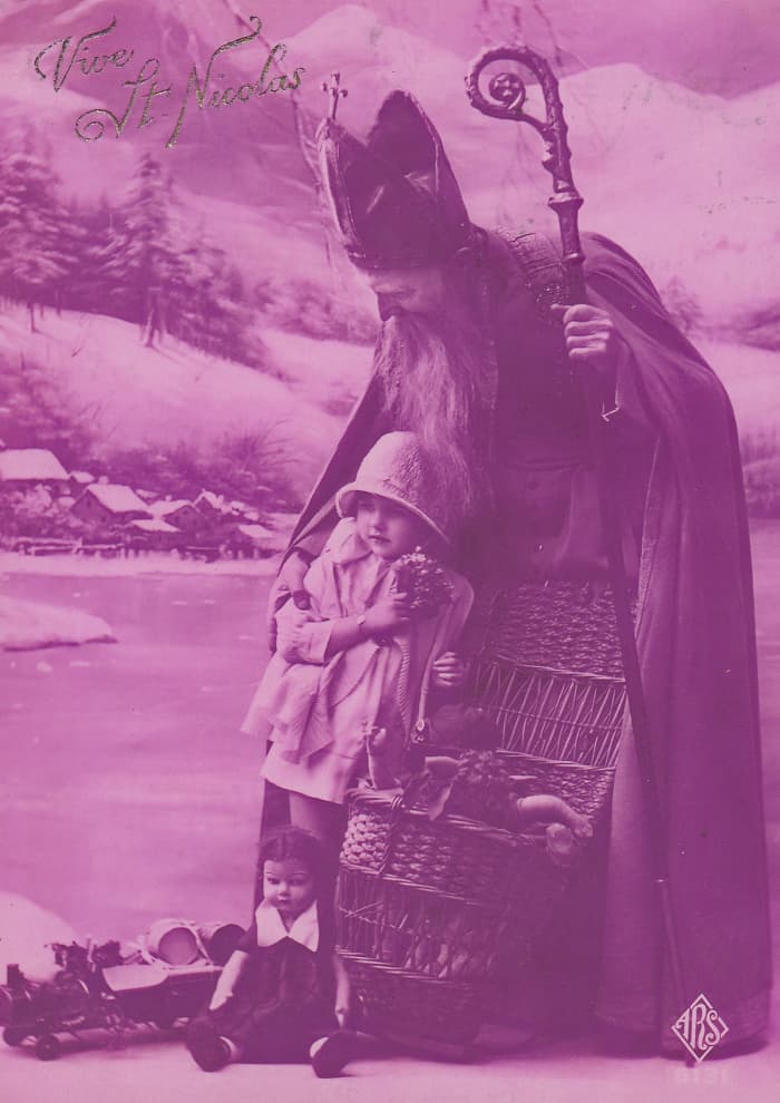 This French image from the 1920s portrays St. Nicholas as a bringer of gifts and protector of small children.