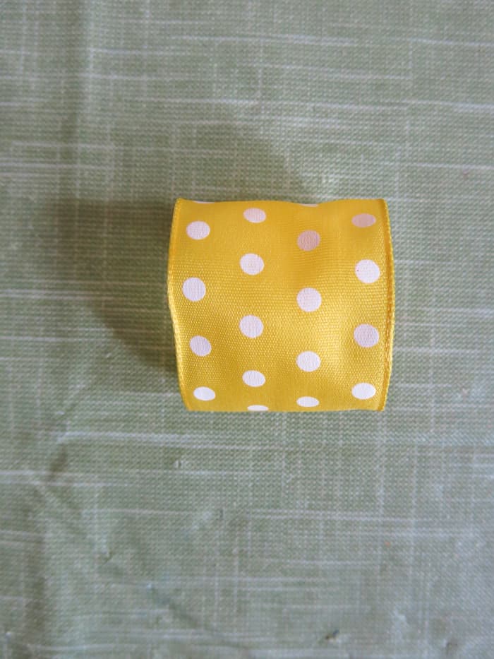 If you are mixing ribbon for your bow, you can use whichever ribbon looks best for the center.