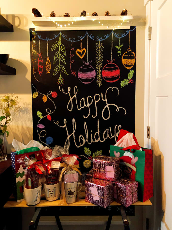 This is my decorative chalkboard. I like to adorn it with seasonal sketches and surround it with gifts for family members.