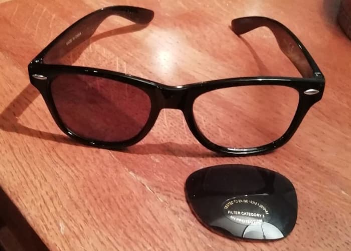 You can pop the lenses out of an old pair of sunglasses to make false eyeglasses for the Clark Kent portion of this costume.
