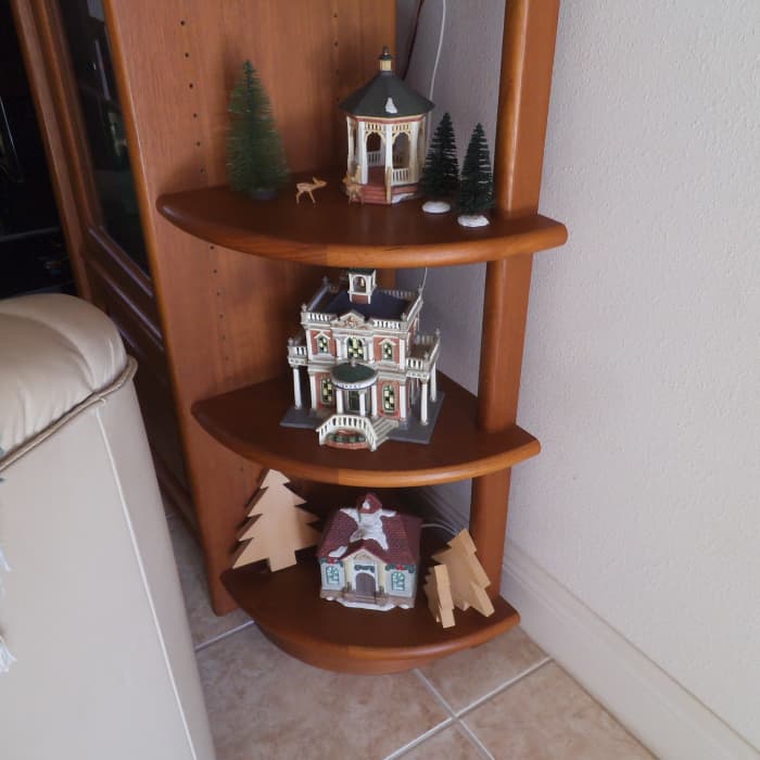 Some people set up a whole village scene with miniature houses at Christmas. I only have a few pieces so I display them this way.